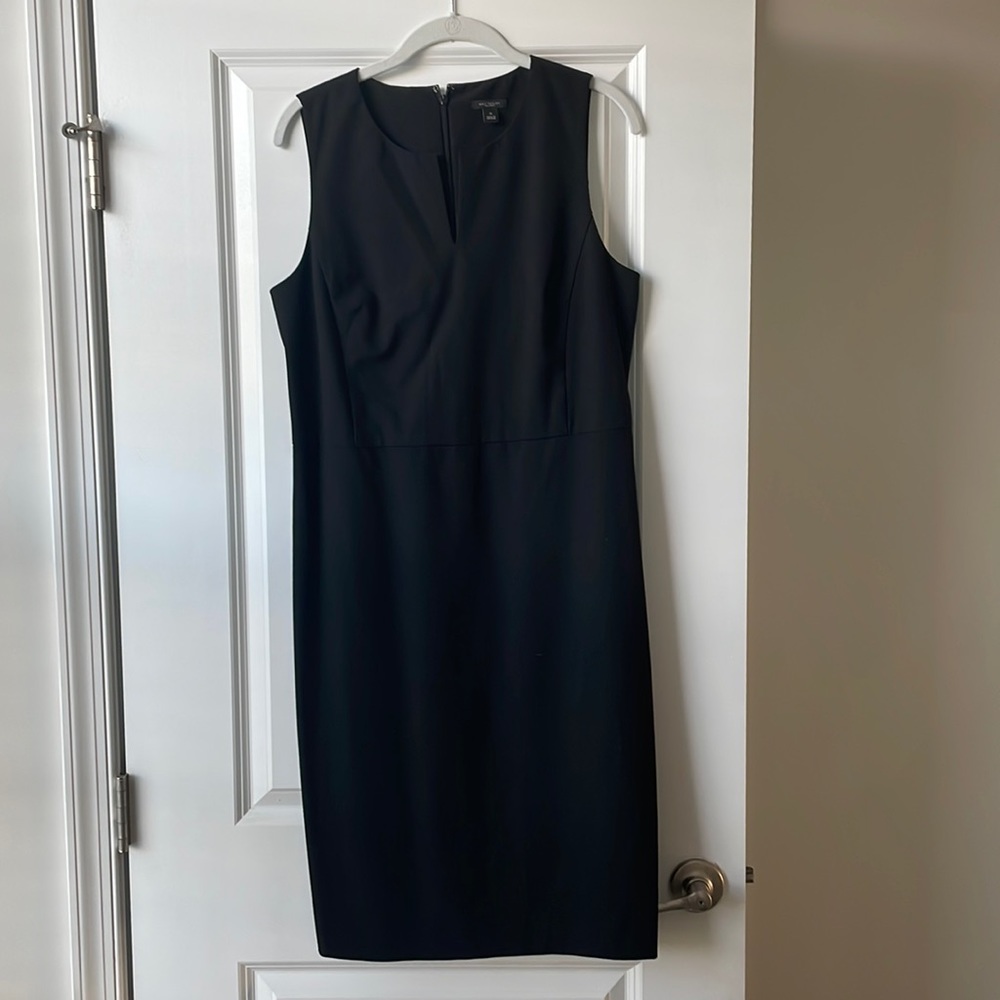 Solid black sheath dress. Size 10. Only worn once.